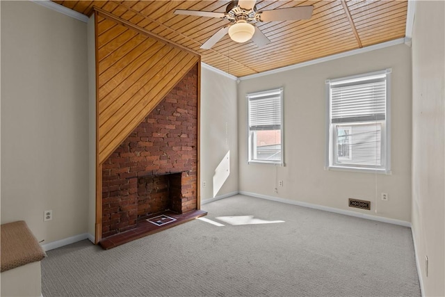 unfurnished living room featuring wooden ceiling, carpet, a fireplace, and crown molding