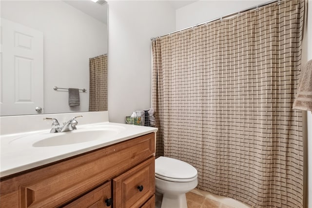 bathroom with a shower with shower curtain, toilet, vanity, and tile patterned flooring