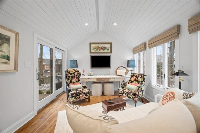 living room with wooden ceiling, lofted ceiling with beams, light wood-type flooring, and baseboards