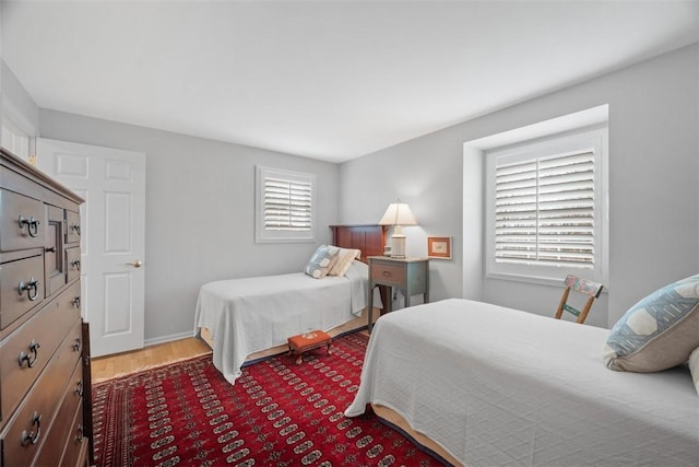 bedroom with wood finished floors