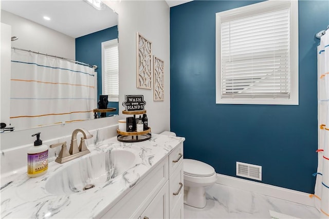 full bath with visible vents, toilet, marble finish floor, baseboards, and vanity