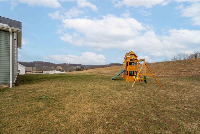 view of yard featuring a playground