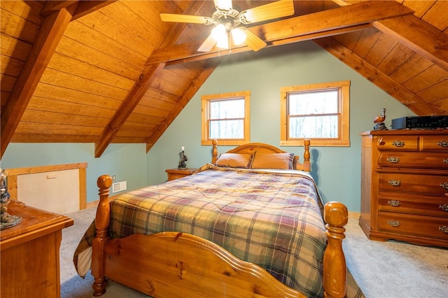 carpeted bedroom featuring visible vents, wooden ceiling, vaulted ceiling with beams, and a ceiling fan