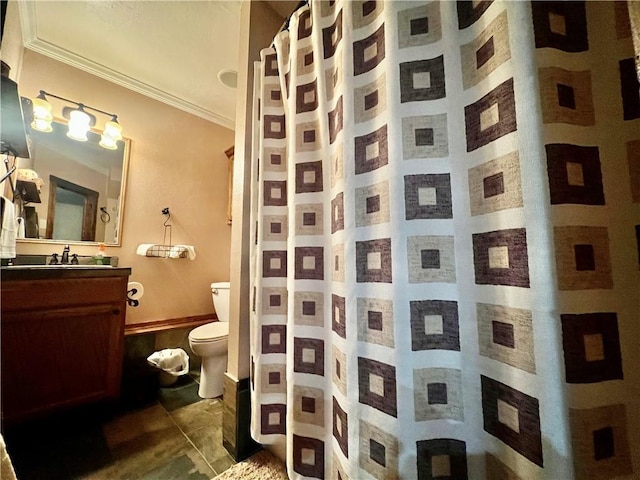 bathroom with curtained shower, toilet, vanity, and ornamental molding