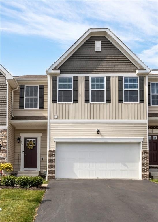 view of front of house featuring driveway and an attached garage