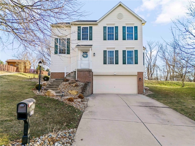 view of front of property with fence, concrete driveway, a front lawn, a garage, and brick siding