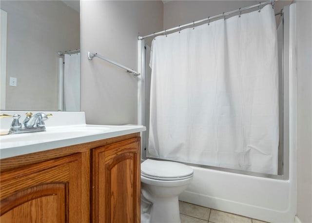 bathroom with vanity, tile patterned floors, toilet, and shower / bathtub combination with curtain