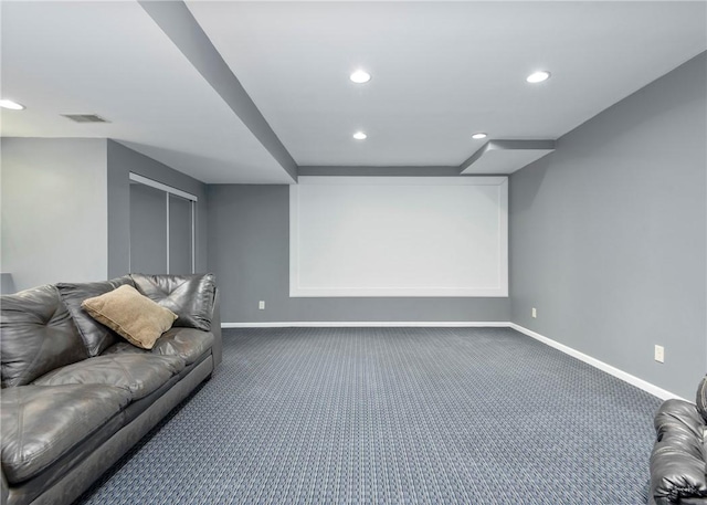 home theater featuring visible vents, recessed lighting, baseboards, and dark carpet