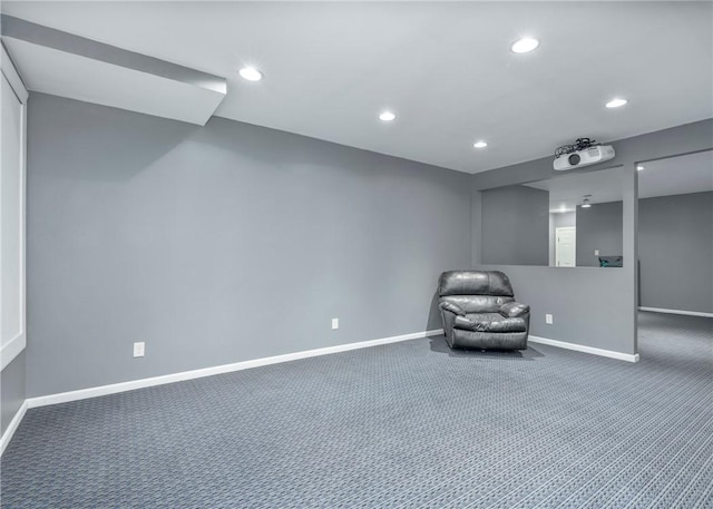 unfurnished room with carpet flooring, recessed lighting, and baseboards