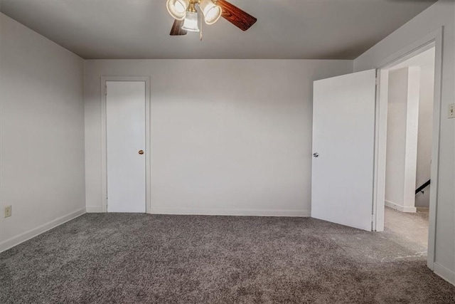 unfurnished bedroom featuring carpet, baseboards, and ceiling fan