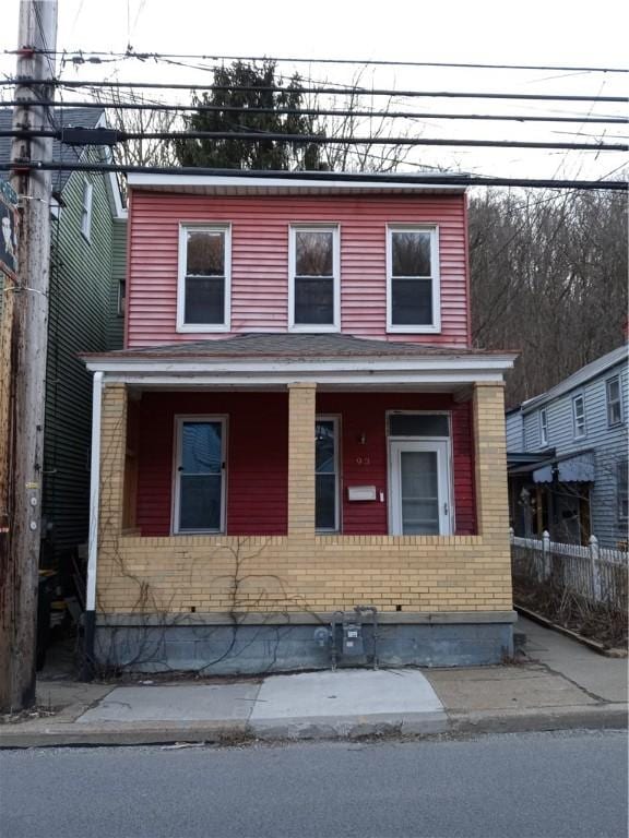 view of front of home with brick siding