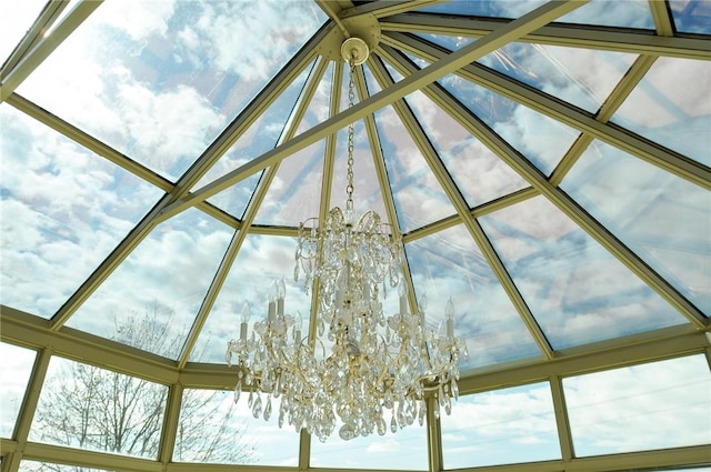 exterior details with a notable chandelier