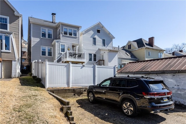 view of front of home with fence