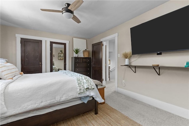 bedroom featuring carpet flooring, ceiling fan, and baseboards