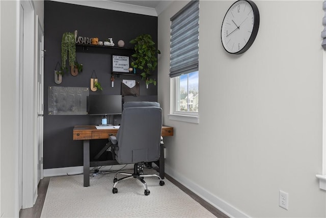 home office with wood finished floors and baseboards