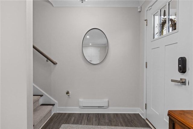 entrance foyer featuring stairs, dark wood-type flooring, baseboards, and a baseboard radiator