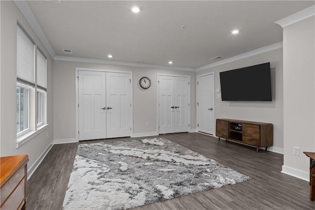 entrance foyer featuring crown molding, recessed lighting, baseboards, and dark wood-style flooring