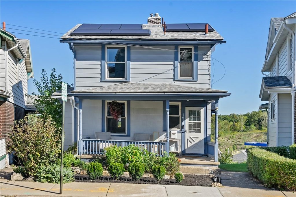 1614 Miriam St, Swissvale, PA 15218 - traditional style home featuring solar panels, a porch, a chimney, and a shingled roof