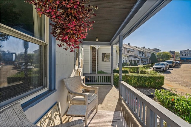 balcony featuring a porch