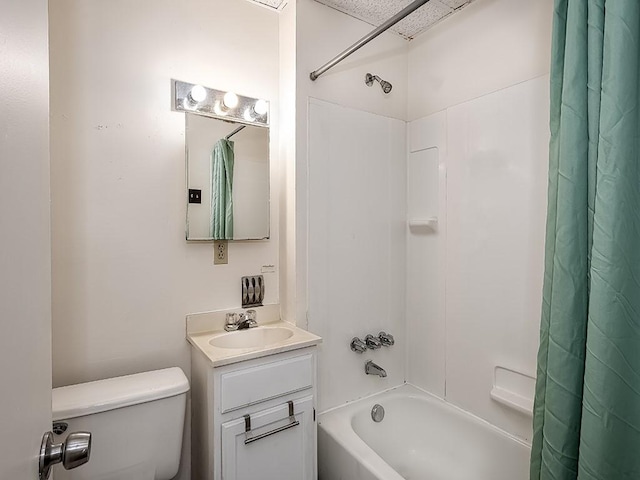 bathroom featuring vanity, toilet, and shower / bath combo