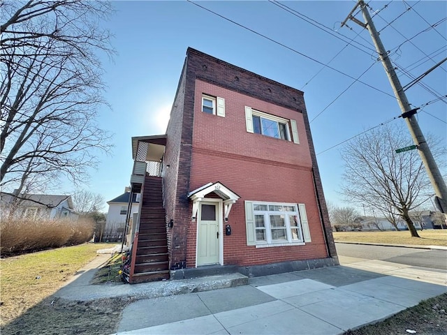 view of front of property with brick siding