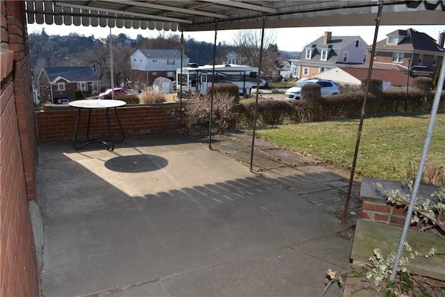 view of patio / terrace with a residential view