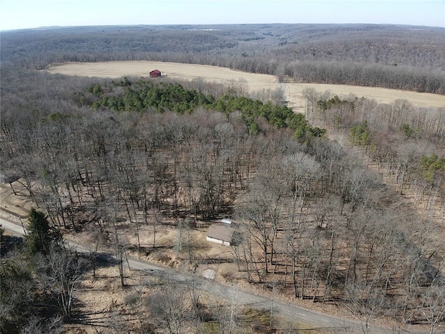 birds eye view of property with a rural view