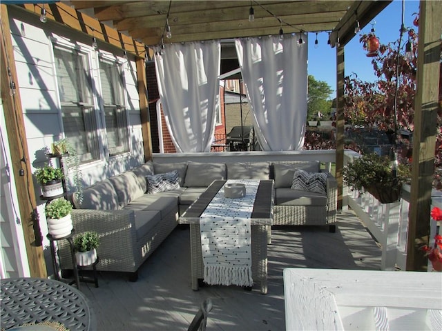 balcony featuring an outdoor living space