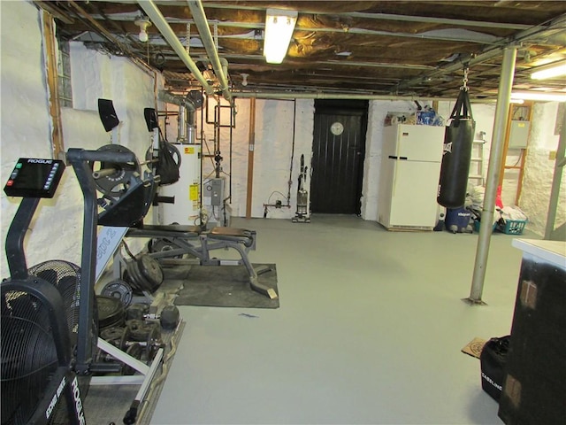 exercise room featuring water heater