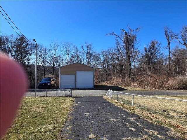 detached garage with fence