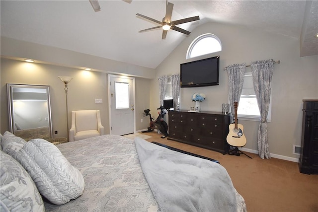 carpeted bedroom with ceiling fan, baseboards, and vaulted ceiling