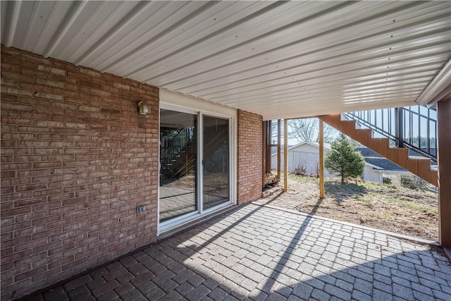 view of patio / terrace featuring stairs