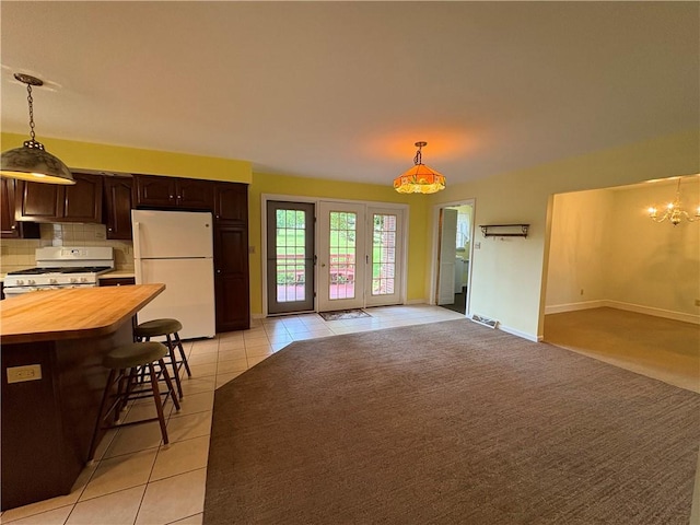 407 Cathedral St, Conemaugh/Young Twps Ind, PA 15681 - living room with light tile patterned floors and a chandelier