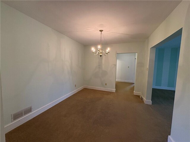 407 Cathedral St, Conemaugh/Young Twps Ind, PA 15681 - unfurnished dining area featuring a chandelier and carpet floors