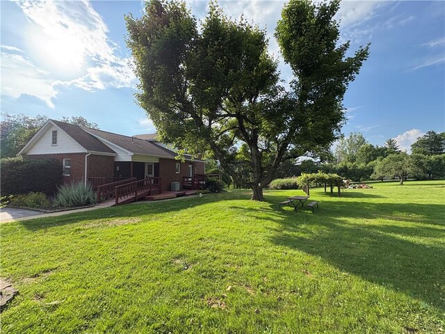 407 Cathedral St, Conemaugh/Young Twps Ind, PA 15681 - view of green lawn with a wooden deck