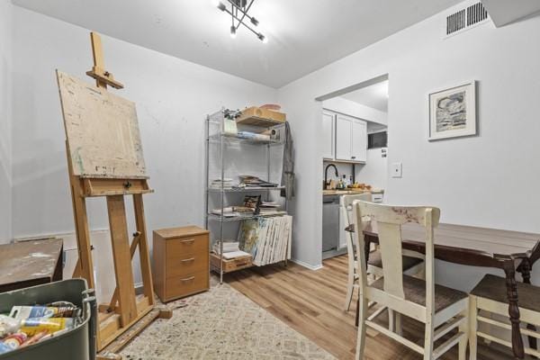 8179 Ohio River Blvd Unit 32, Emsworth, PA 15202 - dining area with visible vents and light wood-style floors
