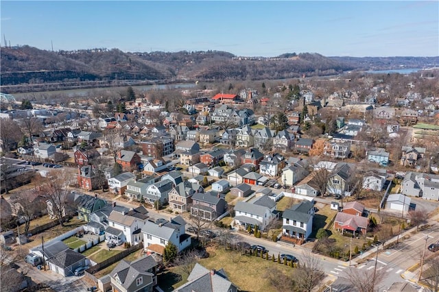 birds eye view of property with a residential view