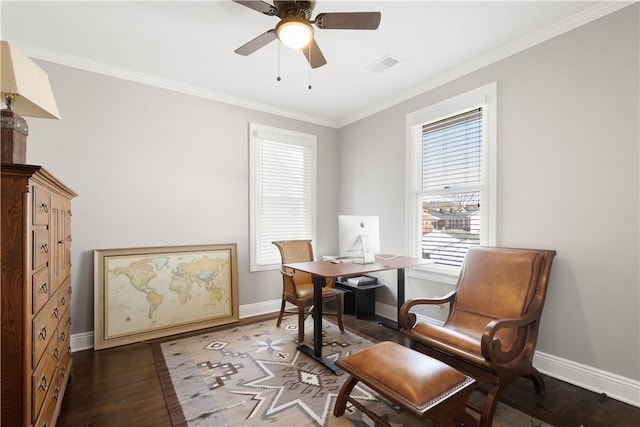 office area with visible vents, crown molding, baseboards, and wood finished floors