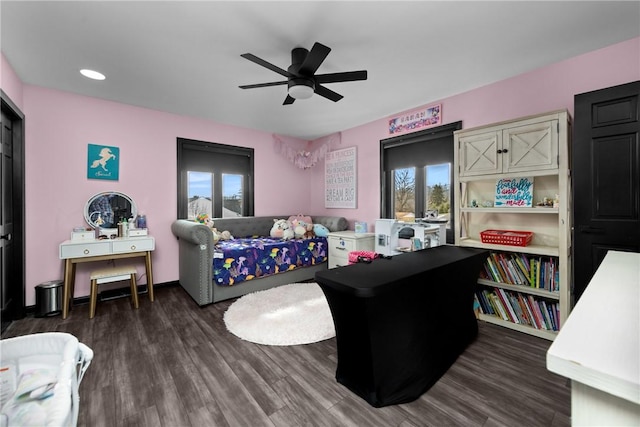 bedroom featuring dark wood-type flooring and ceiling fan