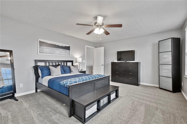 bedroom featuring baseboards, carpet, and ceiling fan