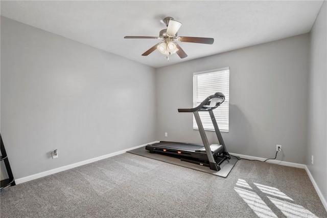 workout area featuring ceiling fan, baseboards, and carpet floors