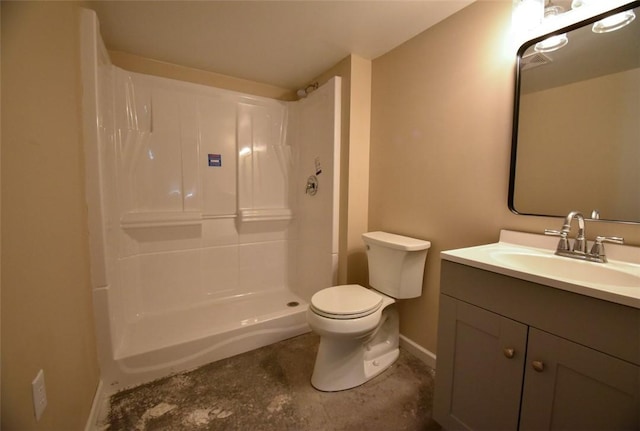 full bathroom with vanity, toilet, baseboards, and walk in shower