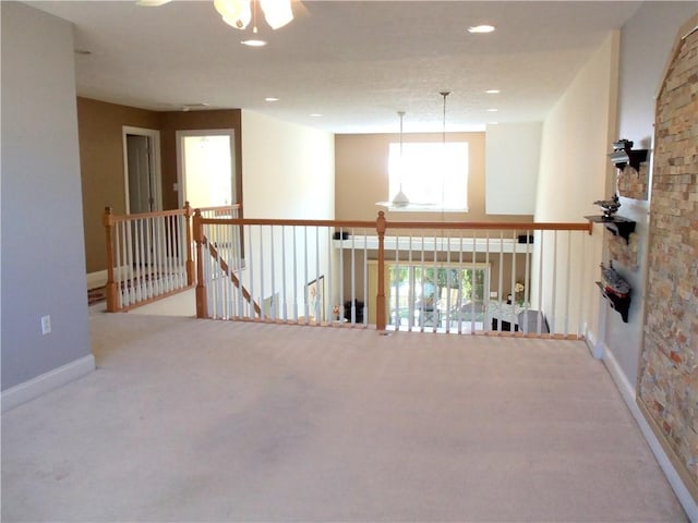 carpeted empty room with recessed lighting, baseboards, and ceiling fan