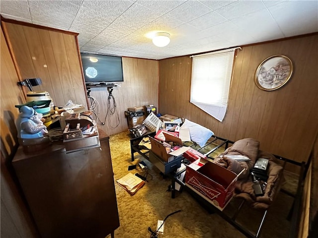 carpeted office with wood walls