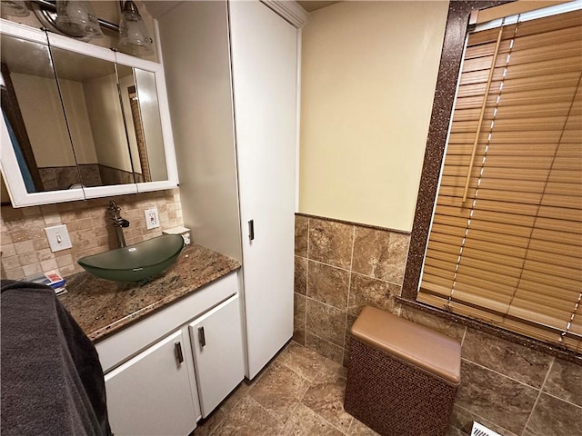 39 Dunkard Ave, Uniontown, PA 15401 - bathroom featuring tile walls, vanity, and wainscoting