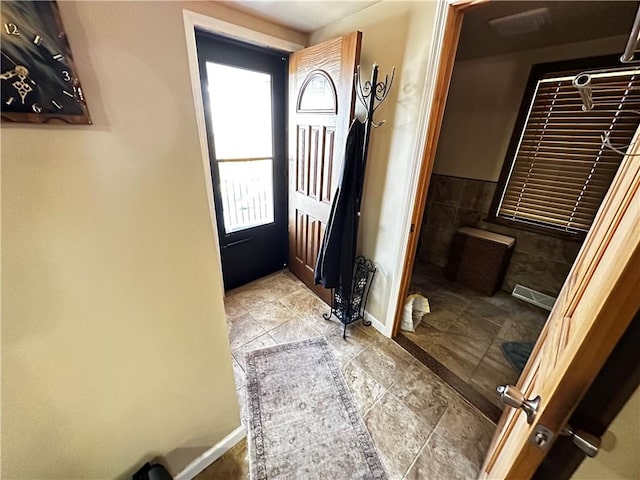 39 Dunkard Ave, Uniontown, PA 15401 - entryway featuring baseboards and tile walls