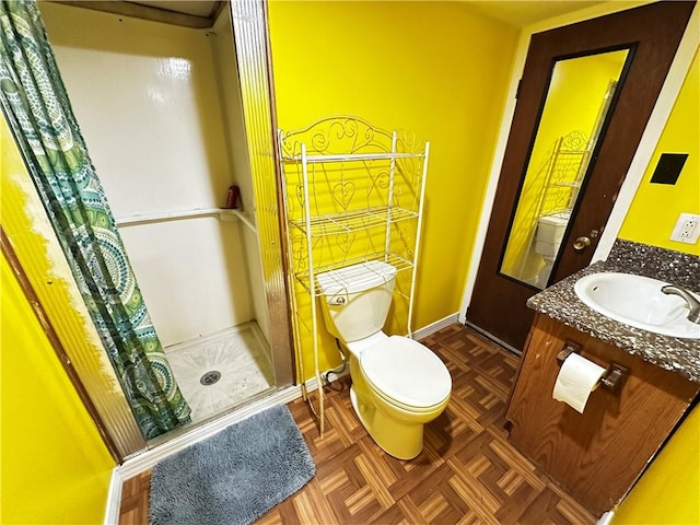 39 Dunkard Ave, Uniontown, PA 15401 - full bathroom featuring toilet, a stall shower, vanity, and baseboards