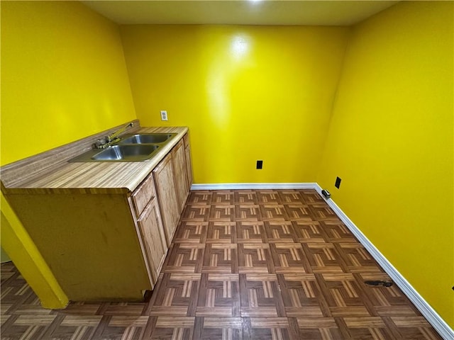 39 Dunkard Ave, Uniontown, PA 15401 - washroom featuring baseboards and a sink