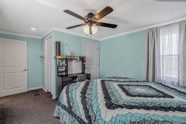 bedroom with visible vents, baseboards, carpet, and crown molding