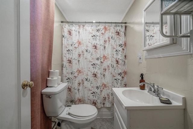 bathroom with a shower with shower curtain, vanity, toilet, and crown molding